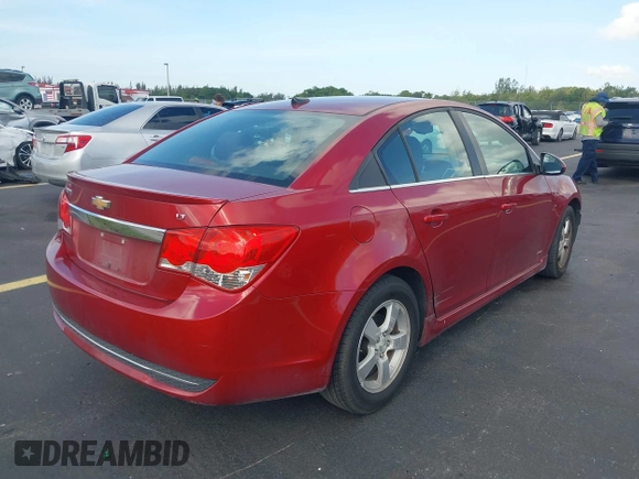 2014 Chevrolet Cruze 1LT z VIN 1G1PC5SB6E7246477, wystawiony jako IAAI lot #42550598 z przebiegiem 98 813 mil mil oraz . Historia ofert i sprzedaży dostępna na DreamBid. Obrazek 4.