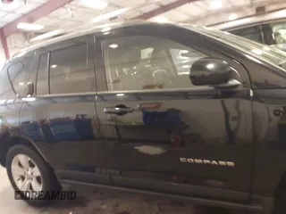2015 Jeep Compass Latitude with VIN 1C4NJDEBXFD304409, listed as a IAAI auction lot 41629121 with 123,486 mi miles. Bid and sale history available at carsss.com. Image 14.