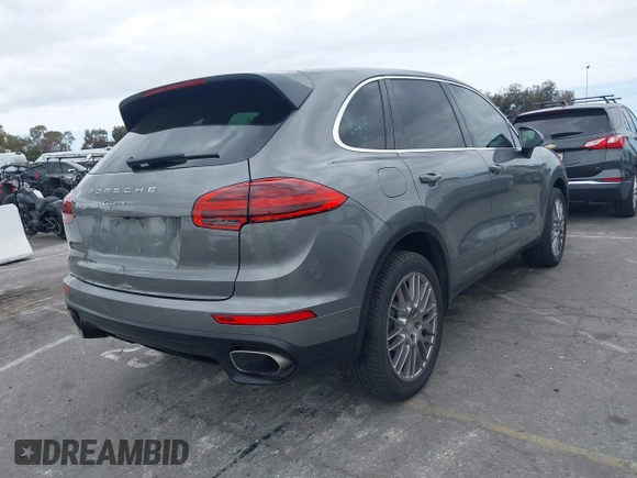 2016 Porsche Cayenne with VIN WP1AA2A27GKA15797, listed as a IAAI auction lot 42063043 with 81,464 mi miles. Bid and sale history available at carsss.com. Image 4.