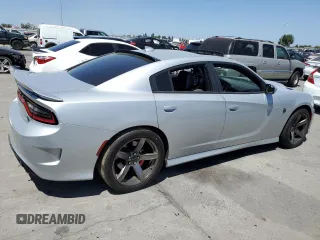 2019 Dodge Charger SRT Hellcat with VIN 2C3CDXL96KH588025, listed as a Copart auction lot 64705614 with 49,659 mi miles and Salvage Title. Bid and sale history available at DreamBid. Image 3.