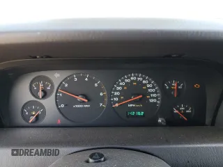 2000 Jeep Grand Cherokee Laredo z VIN 1J4GW48N9YC239166, wystawiony jako Copart lot #53321135 z przebiegiem 142 162 mil mil oraz Szkoda całkowita • Salvage title. Historia ofert i sprzedaży dostępna na DreamBid. Obrazek 9.