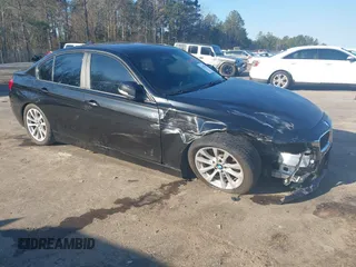 2018 BMW 3 Series 320i with VIN WBA8A9C58JAH13719, listed as a IAAI auction lot 41651935 with 85,137 mi miles. Bid and sale history available at carsss.com. Image 1.
