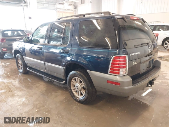 2003 Mercury Mountaineer Convenience z VIN 4M2ZU86W03UJ16828, wystawiony jako IAAI lot #41580919 z przebiegiem 148 968 mil mil oraz . Historia ofert i sprzedaży dostępna na DreamBid. Obrazek 3.