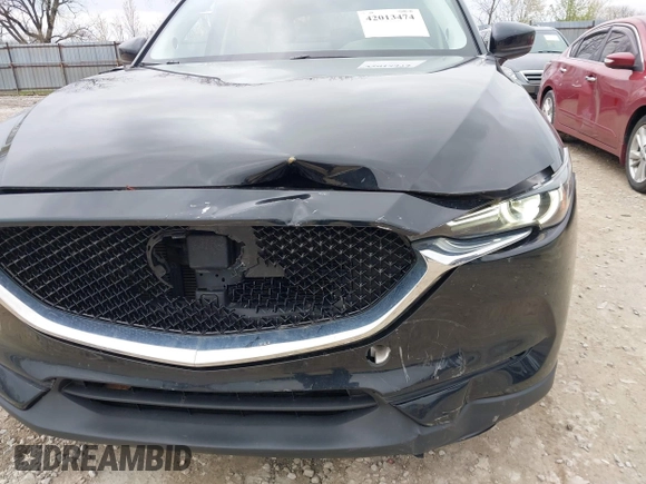 2018 Mazda CX-5 Grand Touring with VIN JM3KFBDM3J0384431, listed as a IAAI auction lot 42013474 with 65,018 mi miles. Bid and sale history available at carsss.com. Image 19.