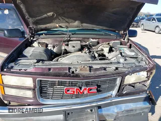 1997 GMC Suburban z VIN 1GKEC16RXVJ703491, wystawiony jako IAAI lot #41219414 z przebiegiem 362 551 mil mil oraz . Historia ofert i sprzedaży dostępna na DreamBid. Obrazek 10.