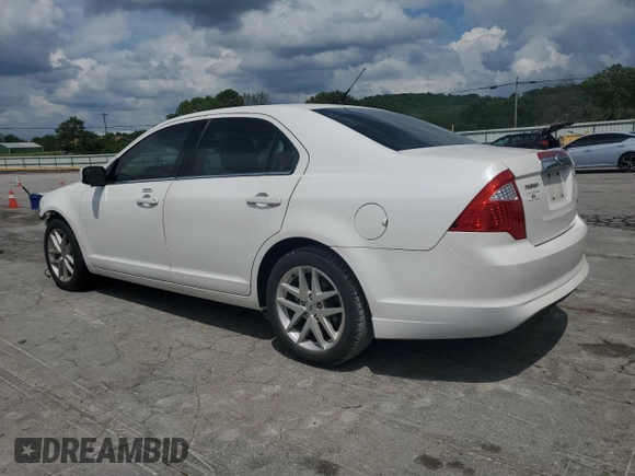 2012 Ford Fusion SEL z VIN 3FAHP0JAXCR241497, wystawiony jako Copart lot #58884165 z przebiegiem 100 813 mil mil oraz Szkoda całkowita • Salvage title. Historia ofert i sprzedaży dostępna na DreamBid. Obrazek 2.
