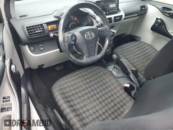 2013 Scion iQ with VIN JTNJJXB01DJ022687, listed as a Copart auction lot 61918195 with 117,483 mi miles and Salvage title. Bid and sale history available at DreamBid. Image 8.