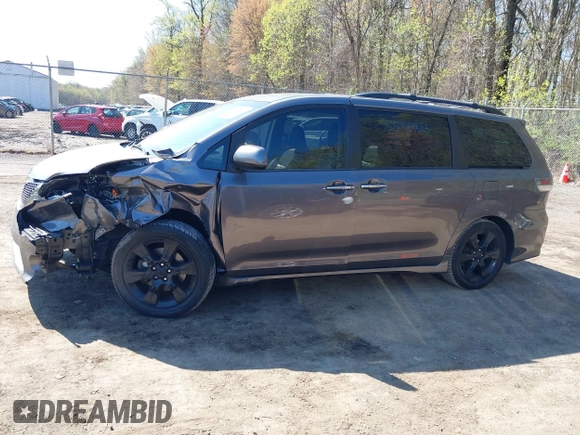 2015 Toyota Sienna SE with VIN 5TDXK3DC3FS682327, listed as a IAAI auction lot 41983156 with 141,640 mi miles. Bid and sale history available at carsss.com. Image 14.