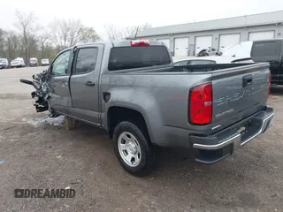 2021 Chevrolet Colorado 2WD Work Truck with VIN 1GCGSBEA6M1278097, listed as a IAAI auction lot 42010677 with 20,288 mi miles and . Bid and sale history available at DreamBid. Image 3.