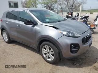 2017 Kia Sportage LX z VIN KNDPMCAC2H7198449, wystawiony jako IAAI lot #42032447 z przebiegiem 93 311 mil mil oraz . Historia ofert i sprzedaży dostępna na DreamBid. Obrazek 1.