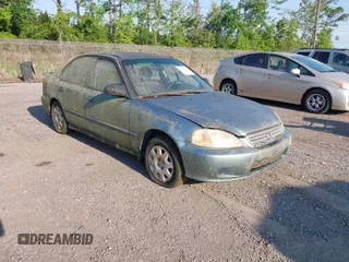 2000 Honda Civic VP with VIN 2HGEJ6616YH562841, listed as a IAAI auction lot 42009111 with 154,571 mi miles. Bid and sale history available at carsss.com. Image 1.