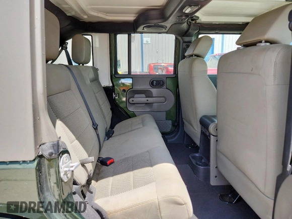 2008 Jeep Wrangler Unlimited Sahara with VIN 1J4GA59148L608970, listed as a Copart auction lot 64433495 with 134,055 mi miles and Salvage title. Bid and sale history available at DreamBid. Image 11.