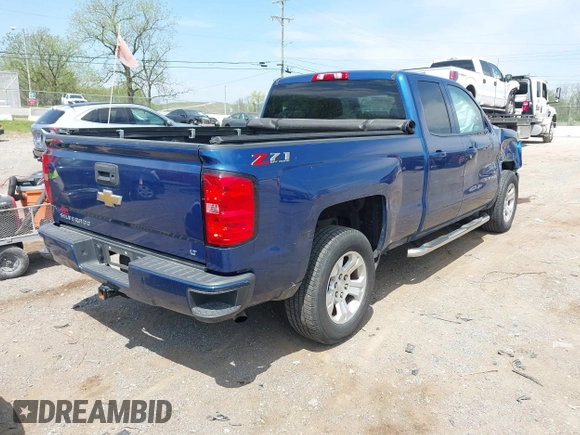 2018 Chevrolet Silverado 1500 LT with VIN 1GCVKREC9JZ123333, listed as a IAAI auction lot 42070916 with 142,814 mi miles and . Bid and sale history available at DreamBid. Image 4.