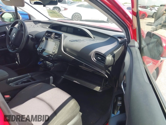 2021 Toyota Prius L Eco with VIN JTDKAMFU4M3145215, listed as a IAAI auction lot 42281566 with 74,220 mi miles and . Bid and sale history available at DreamBid. Image 5.