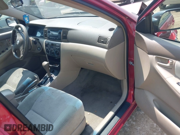 2007 Toyota Corolla CE z VIN JTDBR32E570111498, wystawiony jako IAAI lot #42417995 z przebiegiem 299 999 mil mil oraz . Historia ofert i sprzedaży dostępna na DreamBid. Obrazek 5.