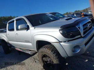 2009 Toyota Tacoma z VIN 5TELU42N09Z596810, wystawiony jako IAAI lot #41673552 z przebiegiem 169 044 mil mil oraz . Historia ofert i sprzedaży dostępna na DreamBid. Obrazek 13.