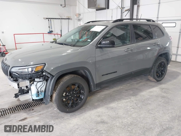 2023 Jeep Cherokee Altitude Lux with VIN 1C4PJMMBXPD115299, listed as a IAAI auction lot 41992492 with 60,232 mi miles. Bid and sale history available at carsss.com. Image 2.