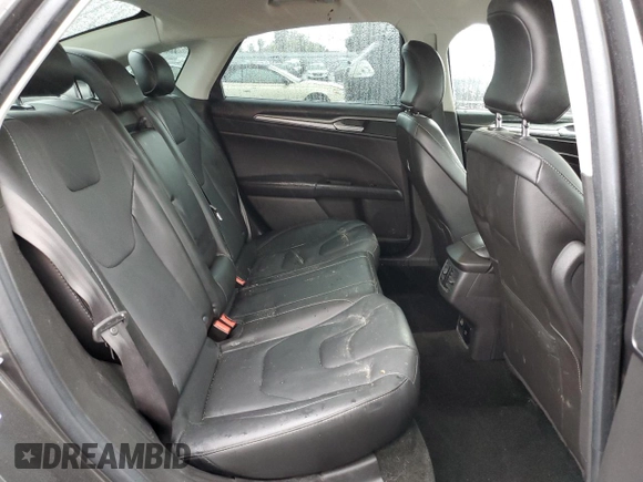 2016 Ford Fusion Titanium Hybrid z VIN 3FA6P0RU5GR356987, wystawiony jako Copart lot #48211775 z przebiegiem 145 192 mil mil oraz Szkoda całkowita • Salvage title. Historia ofert i sprzedaży dostępna na DreamBid. Obrazek 11.