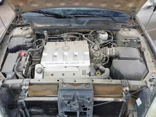 2003 Cadillac DeVille z VIN 1G6KD54Y63U223640, wystawiony jako IAAI lot #41704549 z przebiegiem 127 981 mil mil oraz . Historia ofert i sprzedaży dostępna na DreamBid. Obrazek 10.