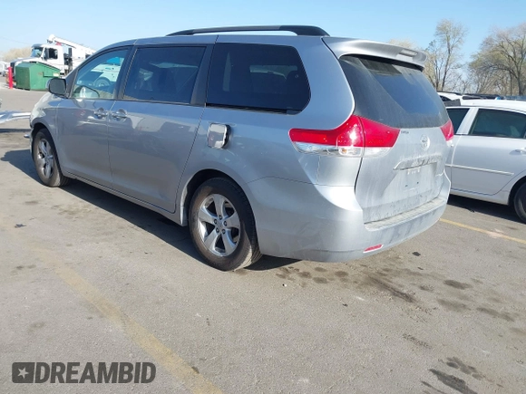 2013 Toyota Sienna LE AAS with VIN 5TDKK3DC6DS371126, listed as a IAAI auction lot 42006353 with 141,425 mi miles. Bid and sale history available at carsss.com. Image 3.