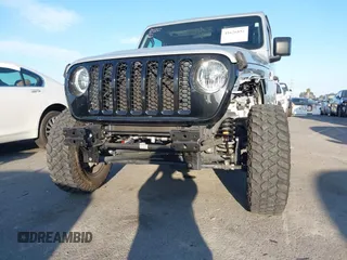 2022 Jeep Gladiator Willys with VIN 1C6HJTAG4NL132558, listed as a IAAI auction lot 41626851 with 28,251 mi miles and . Bid and sale history available at DreamBid. Image 20.