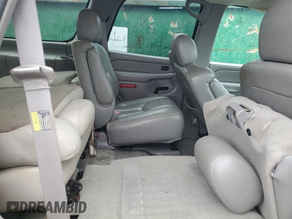 2005 GMC Yukon SLT z VIN 1GKEC13T35J119126, wystawiony jako Copart lot #47849455 z przebiegiem 301 785 mil mil oraz Szkoda całkowita • Salvage title. Historia ofert i sprzedaży dostępna na DreamBid. Obrazek 11.