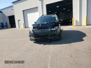 2015 Ford Escape Titanium with VIN 1FMCU9J96FUA43340, listed as a Copart auction lot 55756395 with 142,039 mi miles and Salvage Title. Bid and sale history available at DreamBid. Image 14.