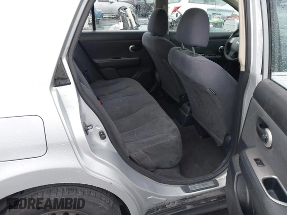 2009 Nissan Versa S with VIN 3N1BC11E39L364397, listed as a IAAI auction lot 41788772 with 223,959 mi miles and . Bid and sale history available at DreamBid. Image 8.