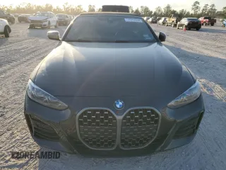 2024 BMW 4 Series M440i with VIN WBA53AT05RCP27562, listed as a Copart auction lot 77213334 with Not Provided miles and Salvage Title. Bid and sale history available at carsss.com. Image 5.