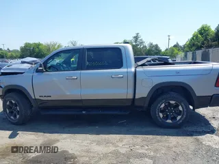 2019 Ram 1500 Rebel with VIN 1C6SRFLT8KN797618, listed as a IAAI auction lot 42556663 with 92,606 mi miles and . Bid and sale history available at DreamBid. Image 14.