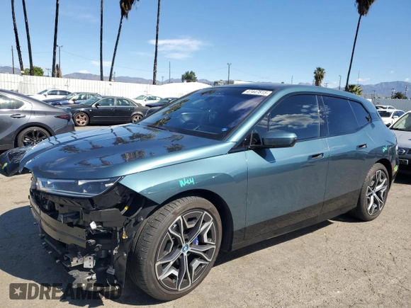 2023 BMW iX M60 with VIN WB533CF01PCM82043, listed as a Copart auction lot 47447815 with 9,058 mi miles and Salvage Title. Bid and sale history available at carsss.com. Image 1.