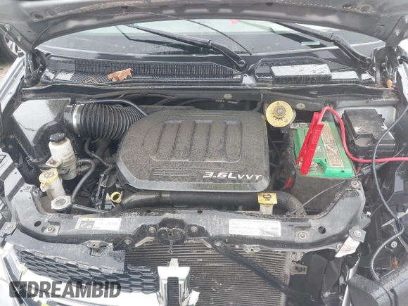 2013 Dodge Grand Caravan SE with VIN 2C4RDGBG2DR773577, listed as a IAAI auction lot 41823951 with 226,498 mi miles and . Bid and sale history available at DreamBid. Image 10.