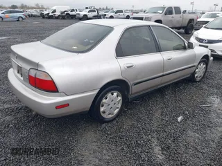 1997 Honda Accord LX with VIN 1HGCD5636VA237594, listed as a IAAI auction lot 41802597 with 215,782 mi miles and . Bid and sale history available at carsss.com. Image 4.
