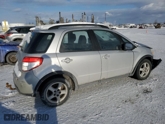 2009 Suzuki SX4 AWD z VIN JS2YB413X95100397, wystawiony jako Copart lot #43039585 z przebiegiem 260 435 mil mil oraz Szkoda całkowita • Salvage title. Historia ofert i sprzedaży dostępna na DreamBid. Obrazek 3.
