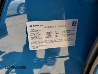 2024 Rivian R1S Adventure z VIN 7PDSGBBA0RN034793, wystawiony jako Copart lot #55091885 z przebiegiem 20 154 mil mil oraz Szkody całkowita. Historia ofert i sprzedaży dostępna na DreamBid. Obrazek 13.