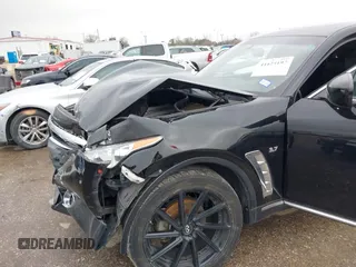 2016 Infiniti QX70 with VIN JN8CS1MU8GM672048, listed as a IAAI auction lot 41625197 with 94,317 mi miles and . Bid and sale history available at DreamBid. Image 6.