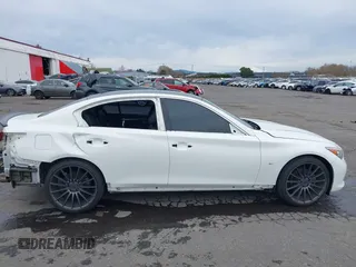 2014 Infiniti Q50 Premium z VIN JN1BV7AP8EM671403, wystawiony jako IAAI lot #41837716 z przebiegiem 115 058 mil mil oraz . Historia ofert i sprzedaży dostępna na DreamBid. Obrazek 14.