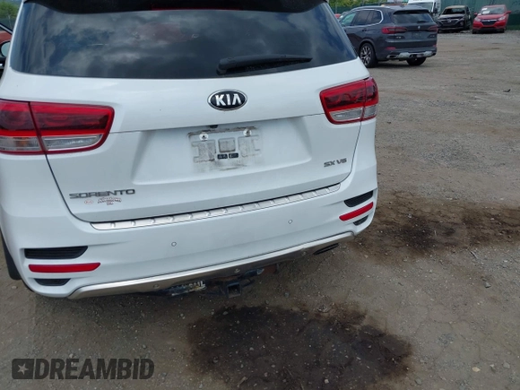 2018 Kia Sorento SX Limited with VIN 5XYPKDA55JG429852, listed as a IAAI auction lot 42823592 with 84,317 mi miles and . Bid and sale history available at DreamBid. Image 12.