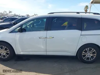 2011 Honda Odyssey EX-L with VIN 5FNRL5H67BB007777, listed as a IAAI auction lot 41402903 with 210,921 mi miles. Bid and sale history available at carsss.com. Image 15.
