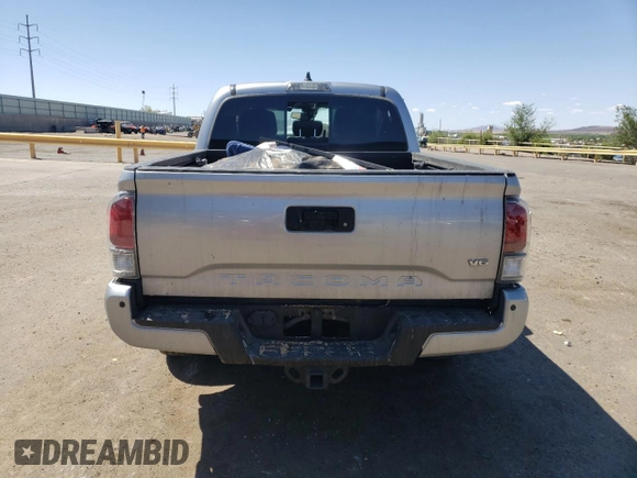 2022 Toyota Tacoma SR with VIN 3TMCZ5AN4NM470997, listed as a Copart auction lot 55165855 with 67,161 mi miles and Salvage title. Bid and sale history available at DreamBid. Image 6.