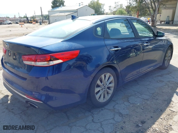 2018 Kia Optima LX with VIN 5XXGT4L31JG268493, listed as a IAAI auction lot 41965277 with 97,458 mi miles. Bid and sale history available at carsss.com. Image 4.