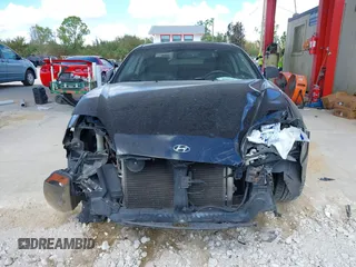 2006 Hyundai Tiburon GT z VIN KMHHN65F56U224768, wystawiony jako IAAI lot #40672721 z przebiegiem 158 535 mil mil oraz . Historia ofert i sprzedaży dostępna na DreamBid. Obrazek 13.