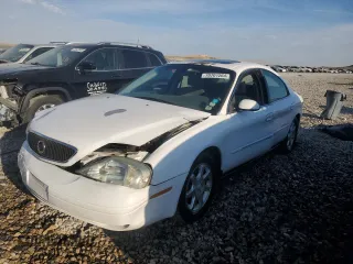 2000 Mercury Sable z VIN 1MEFM53U7YG640279, wystawiony jako Copart lot #70701264 z przebiegiem 118 790 mil mil oraz Szkody całkowita. Historia ofert i sprzedaży dostępna na DreamBid. Obrazek 1.