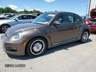 2012 Volkswagen Beetle 2.5L PZEV with VIN 3VWJP7AT7CM661881, listed as a Copart auction lot 63196205 with 24,799 mi miles and Clean title. Bid and sale history available at DreamBid. Image 1.