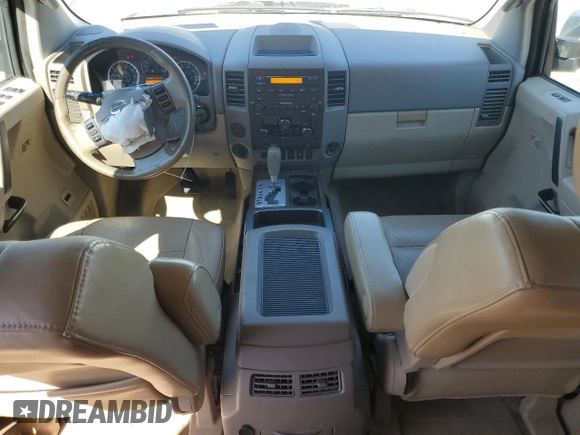 2012 Nissan Titan SV with VIN 1N6BA0ED9CN302103, listed as a Copart auction lot 52678495 with 214,564 mi miles and Salvage title. Bid and sale history available at DreamBid. Image 8.
