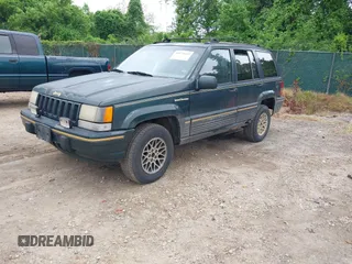 1993 Jeep Grand Cherokee Limited with VIN 1J4GZ78Y2PC540394, listed as a IAAI auction lot 42171655 with 94,417 mi miles and . Bid and sale history available at DreamBid. Image 2.