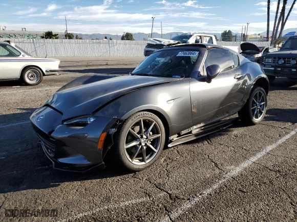 2018 Mazda MX-5 Miata RF Grand Touring with VIN JM1NDAM7XJ0203115, listed as a Copart auction lot 77463864 with 31,043 mi miles and Salvage Title. Bid and sale history available at carsss.com. Image 1.