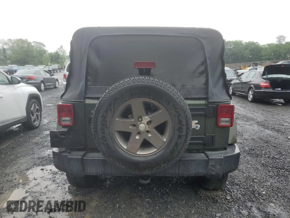 2007 Jeep Wrangler Unlimited Sahara с VIN 1J4GA59107L141710, выставлен на аукционе Copart как лот 59939755 с пробегом 212 659 миль миль и Списание • Salvage title. История ставок и продаж доступна на DreamBid. Изображение 6.