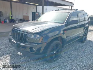 2005 Jeep Grand Cherokee Laredo with VIN 1J4GS48K05C511231, listed as a IAAI auction lot 41737924 with 179,411 mi miles. Bid and sale history available at carsss.com. Image 2.