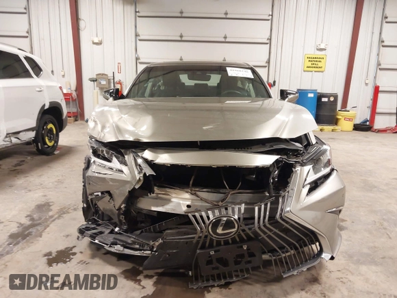 2021 Lexus ES 250 z VIN 58AD11D11MU007968, wystawiony jako IAAI lot #41968246 z przebiegiem 11 522 mil mil oraz . Historia ofert i sprzedaży dostępna na DreamBid. Obrazek 6.